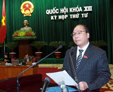 Phó Thủ tướng Nguyễn Xuân Phúc báo cáo Quốc hội về việc thực hiện các Nghị quyết của Quốc hội về chất vấn và trả lời chất vấn tại kỳ họp thứ 2 và thứ 3