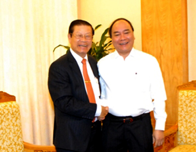 Phó Thủ tướng Nguyễn Xuân Phúc và Phó Thủ tướng Lào Somsavad Lengsavath