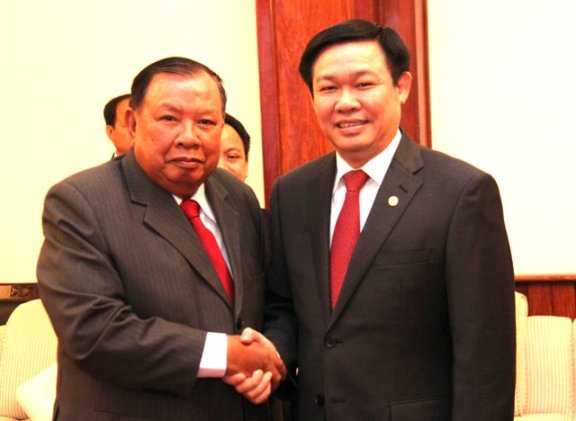 Phó Chủ tịch nước Bounnhang Volachít tiếp đồng chí Vương Đính Huệ