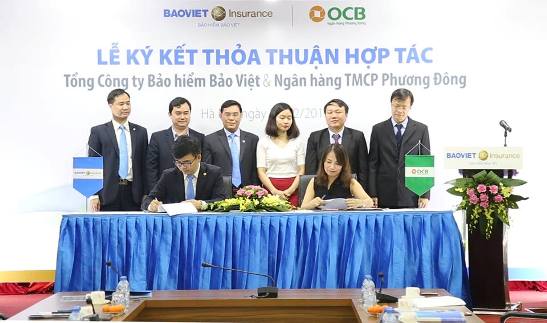 Đại diện lãnh đạo Tổng Công ty Bảo hiểm Bảo Việt và OCB ký kết hợp tác
