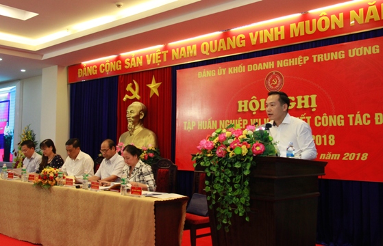 Đồng chí Hồ Xuân Trường - Chánh Văn phòng Đảng ủy Khối DNTW báo cáo kết quả công tác 6 tháng đầu năm 2018 của Đảng bộ Khối