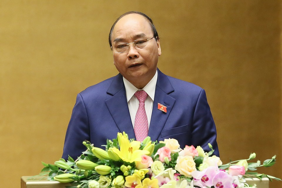 Thủ tướng Chính phủ Nguyễn Xuân Phúc trình bày báo cáo trước Quốc hội.